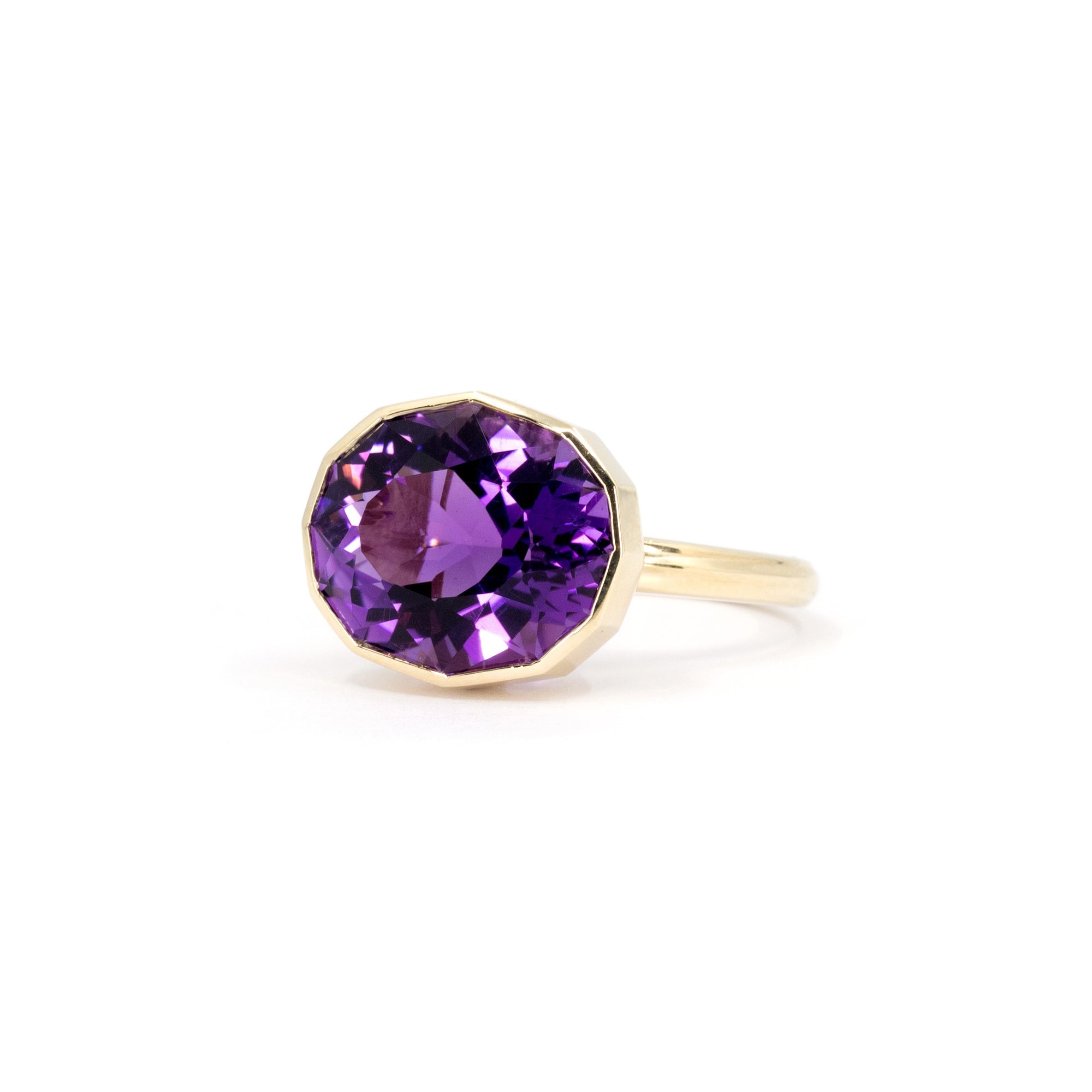 Bold Brazilian amethyst cocktail ring, part of the Fancy Edgy collection by Bena Jewelry, photographed on a pristine white surface.