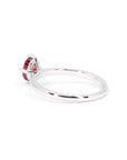 Back view of minimalist white gold ring featuring a vibrant oval ruby, designed by Canadian jewelry designer Bena Jewelry.