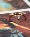 Minimalist ring with a pear-shaped lab-grown diamond worn in a stack, highlighting its delicate design and robust structure. Handcrafted by Bena Jewelry in Montreal, perfect for layering or wearing solo.