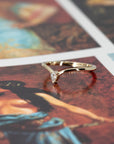 Close-up of the minimalist ring showcasing the pear-shaped lab-grown diamond and the subtle curve on the band. A delicate yet robust design, handcrafted by Bena Jewelry in Montreal.