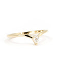 Side view of the minimalist ring with a small pear-shaped lab-grown diamond, highlighting the sleek curve of the band. Handcrafted by Bena Jewelry in Montreal for a timeless and ethical design.