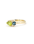 Detailed shot of the ring in natural light – A unique custom ring highlighting the beauty of natural gemstones and expert craftsmanship.
