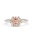 Custom Salmon Pink Marquise Diamond Engagement Ring, made in Montreal – A bespoke bridal ring featuring a central marquise-cut pink diamond surrounded by pear-cut diamonds, handcrafted by Bena Jewelry.