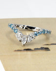 Top-down view of the Blue Mirage platinum ring, highlighting the symmetry and sparkle of the diamond setting by Bena Jewelry.