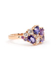 Side view: Reveals the secure gemstone settings and the fine craftsmanship of the yellow gold band. Designed by Bena Jewelry in Montreal, Canada.