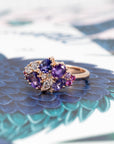 Side view: Highlights the depth and brilliance of the sapphires and diamonds, set in a sleek yellow gold band. Custom-made by Bena Jewelry, Montreal, Canada.