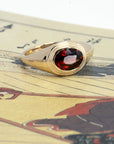 BEZEL OVAL PYROPE | Yellow Gold Ring