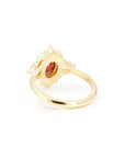back view of yellow gold bridal engagement ring custom made in montreal on white background