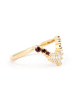 Custom-made wedding band featuring pyrope garnets and pear diamonds in yellow gold, handcrafted by Bena Jewelry, a Montreal-based designer.
