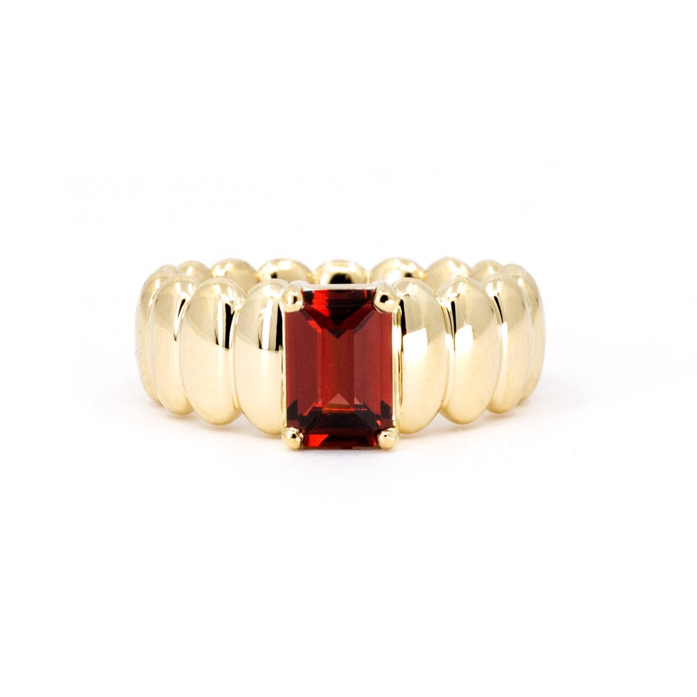 Front view of the Pyrope Pigalle Ring, showcasing the emerald-cut pyrope garnet and bold yellow gold setting. Made by the indepandant designer Bena Jewelry.