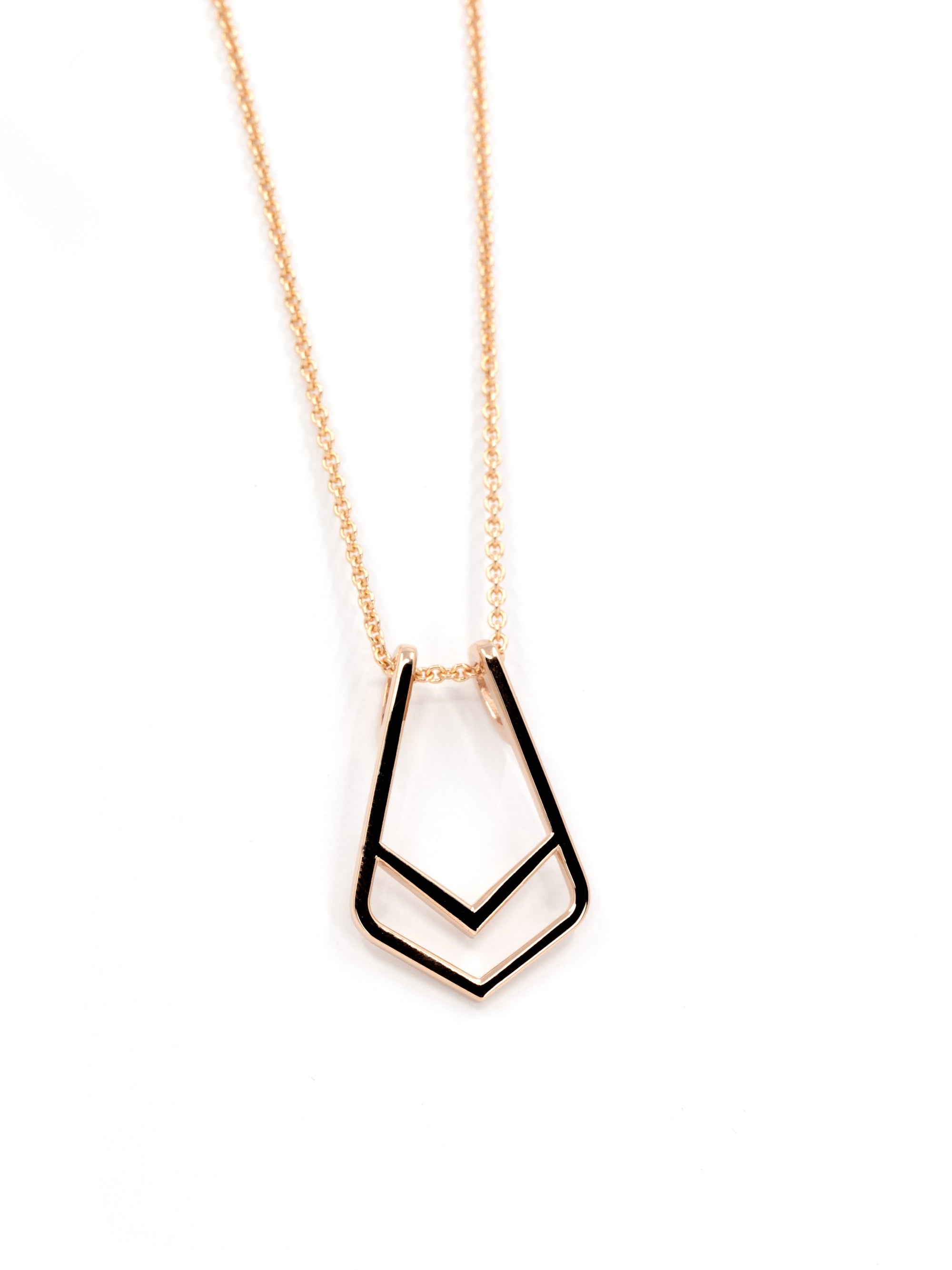 Side view of Ring Holder Pendant in Rose Gold – A contemporary pendant with a smooth, polished surface and a minimalist structure.