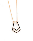 Side view of Ring Holder Pendant in Rose Gold – A contemporary pendant with a smooth, polished surface and a minimalist structure.