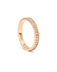 Close-up of the stunning 1.50 mm lab-grown diamonds in a pinpoint setting on a rose gold band. Handcrafted in Montreal, Quebec by Bena Jewelry, this wedding band offers brilliant shine and modern elegance.
