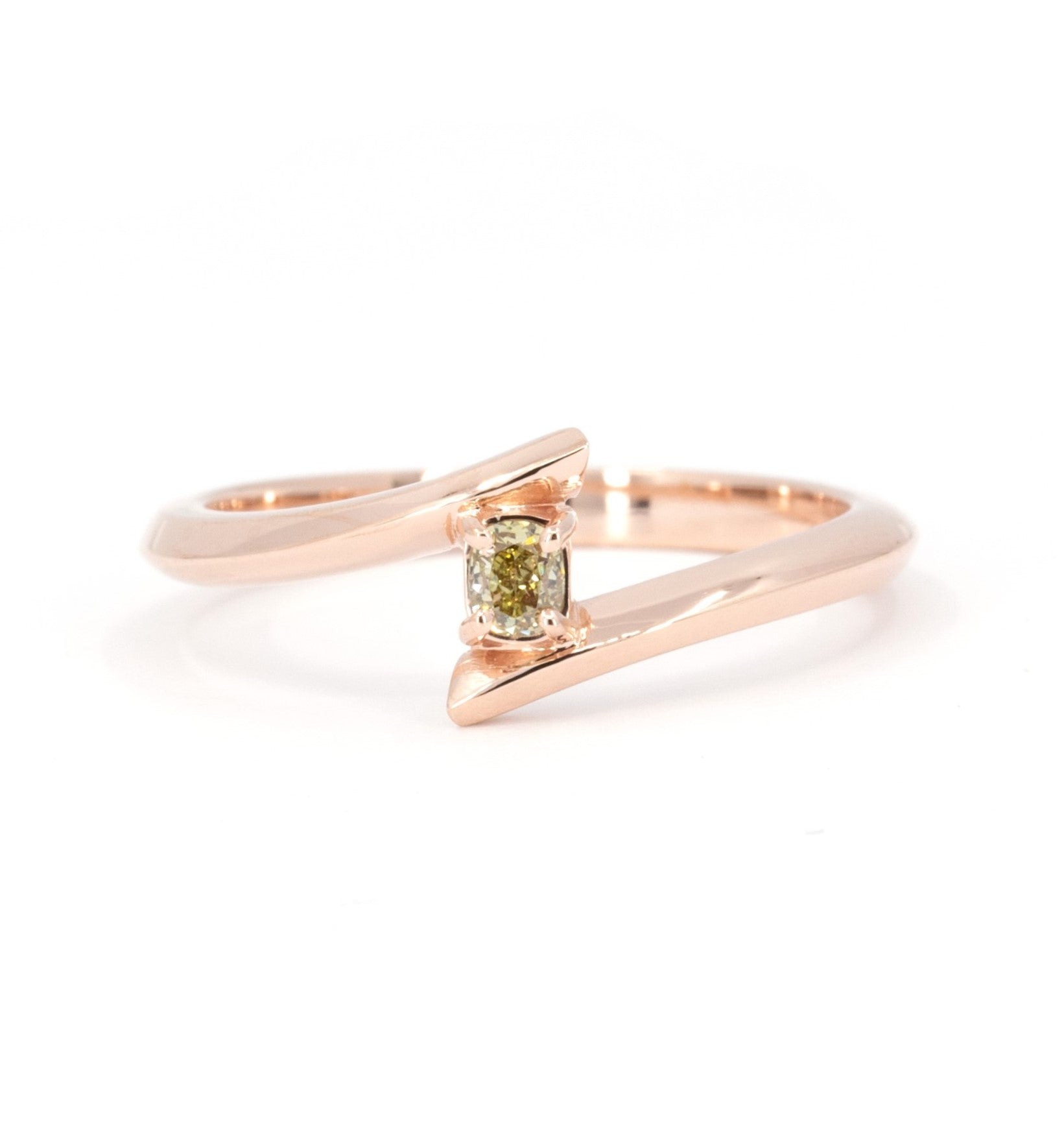 Kink Yellow Diamond Ring by Bena Jewelry, crafted in rose gold with a natural cushion-cut yellow diamond, displayed on a white background. Handmade in Montreal.