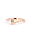 Unique minimalist ring with a yellow diamond in rose gold, designed by Bena Jewelry, photographed on a white background. Handmade in Montreal.