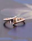 Kink Yellow Diamond Ring by Bena Jewelry, crafted in rose gold with a cushion-cut yellow diamond, photographed on a dark background. Modern and edgy design, handmade in Montreal.