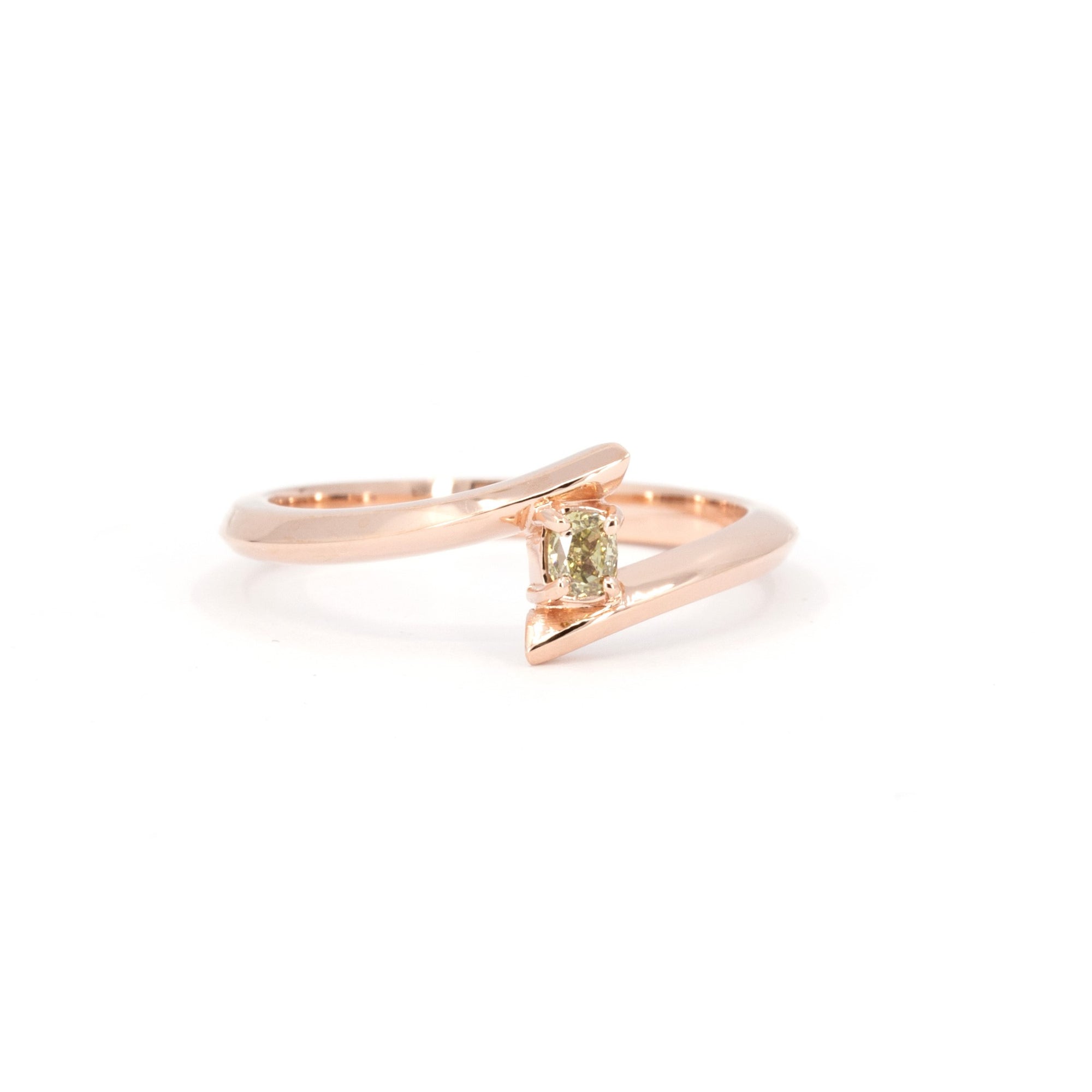 Edgy rose gold engagement ring featuring a natural yellow diamond by Bena Jewelry, showcased on a clean white background. Custom-made in Montreal, Canada.
