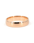 Rose gold men's wedding band with a matte center and polished edges, rounded profile. Handmade by Bena Jewelry in Montreal, Canada.