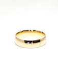 Classic domed wedding band in yellow gold, handcrafted in Montreal by Bena Jewelry, featuring a smooth curved profile for timeless elegance.