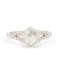 Hexagonal salt and pepper diamond ring with a split shank band, displayed on a white background. Custom bridal jewelry by Bena Jewelry, Montreal."