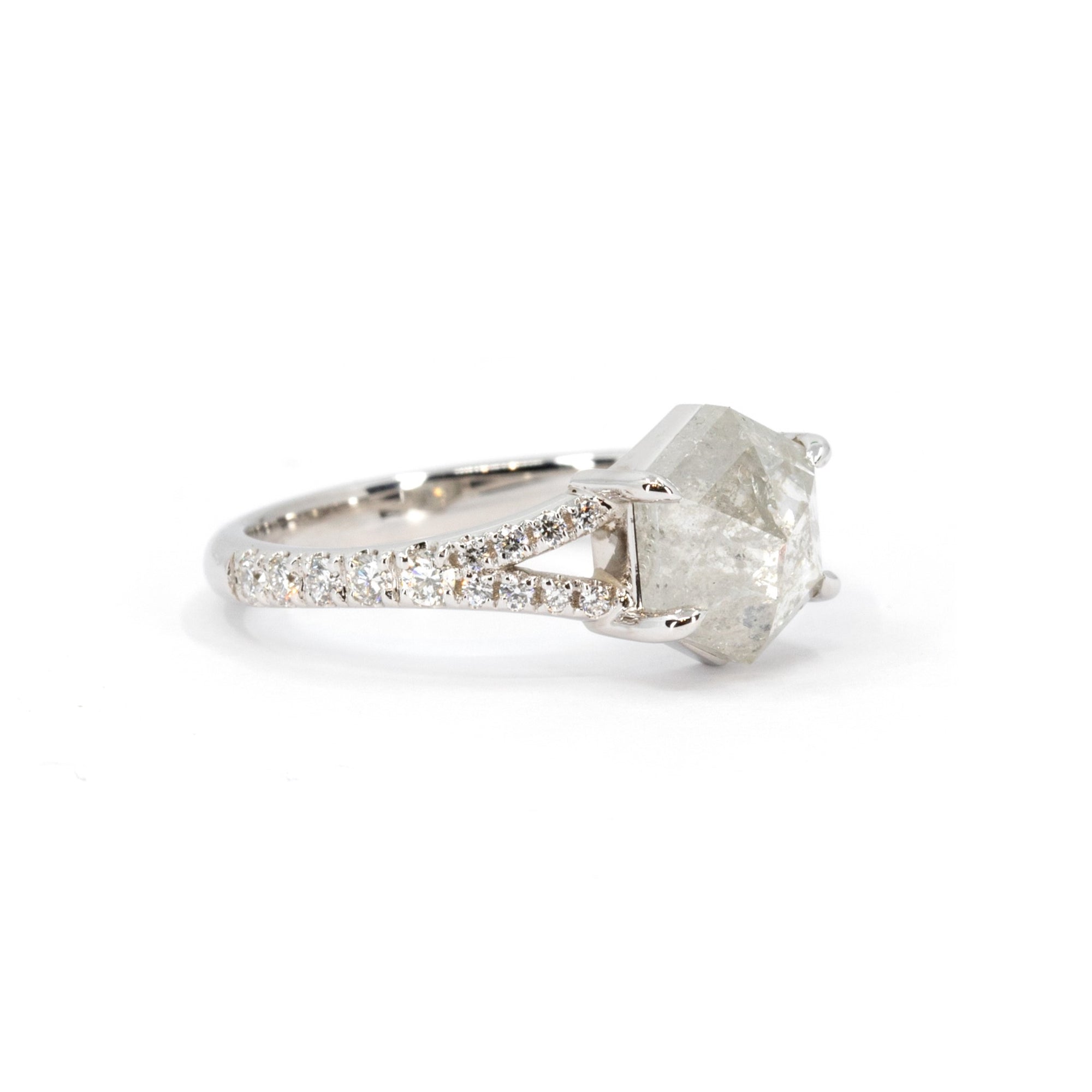 Detailed close-up of a hexagonal salt and pepper diamond ring, showcasing its unique design and fine craftsmanship by Bena Jewelry in Montreal.