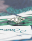 Unique fine jewelry ring featuring a natural hexagonal salt and pepper diamond, crafted by Bena Jewelry in Montreal, Canada.