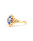 Side view of floral sapphire ring – A refined engagement ring with an elegant, nature-inspired aesthetic, handcrafted in yellow gold.