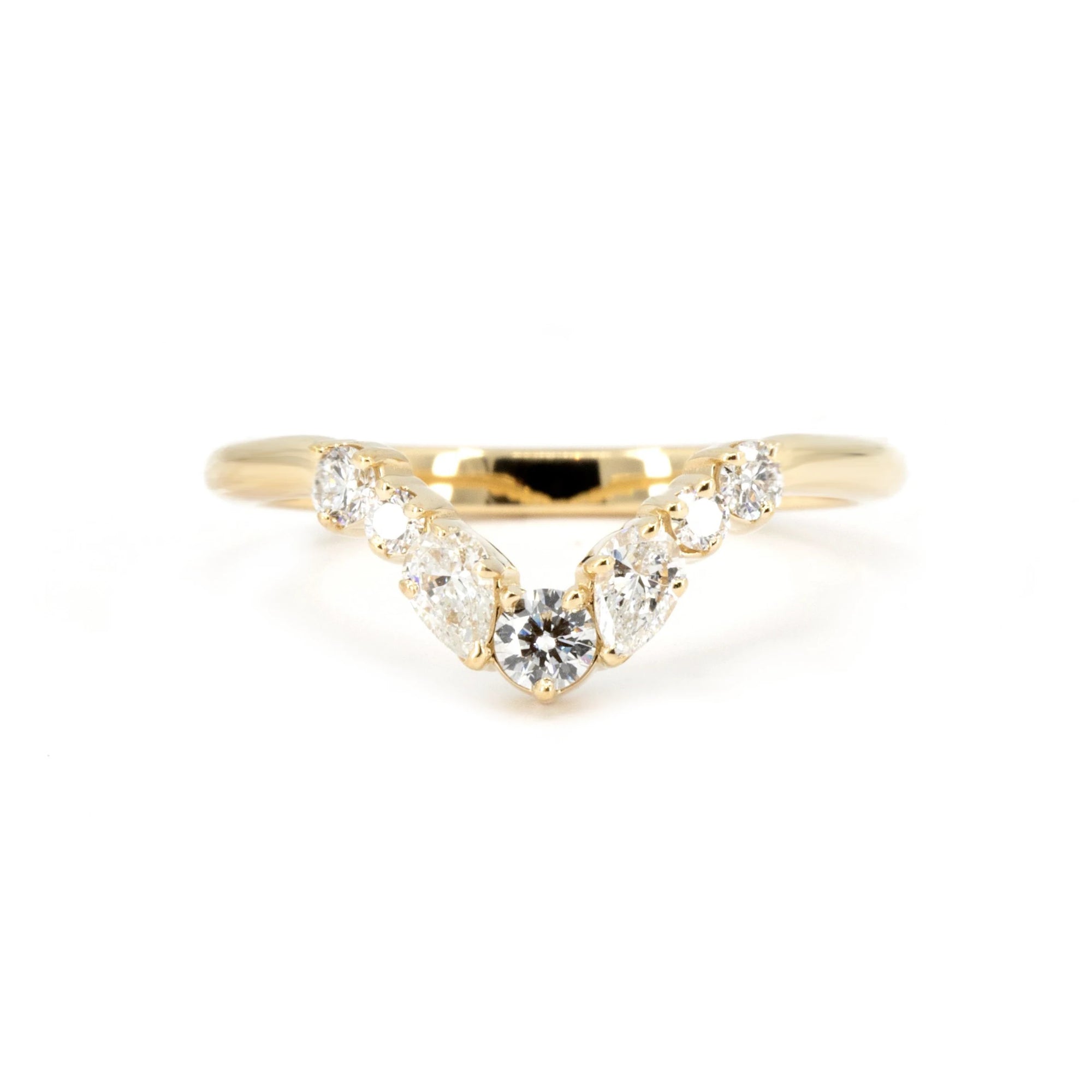 Yellow gold wedding band with round and pear-shaped diamonds in a V-shape design, crafted in Montreal by Bena Jewelry. Ideal for stacking or wearing alone.