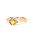 Top view of a handcrafted yellow and brown diamond ring by Bena Jewelry, fine jewelry made in Montreal, set in warm 14k gold, displayed on clean white surface.