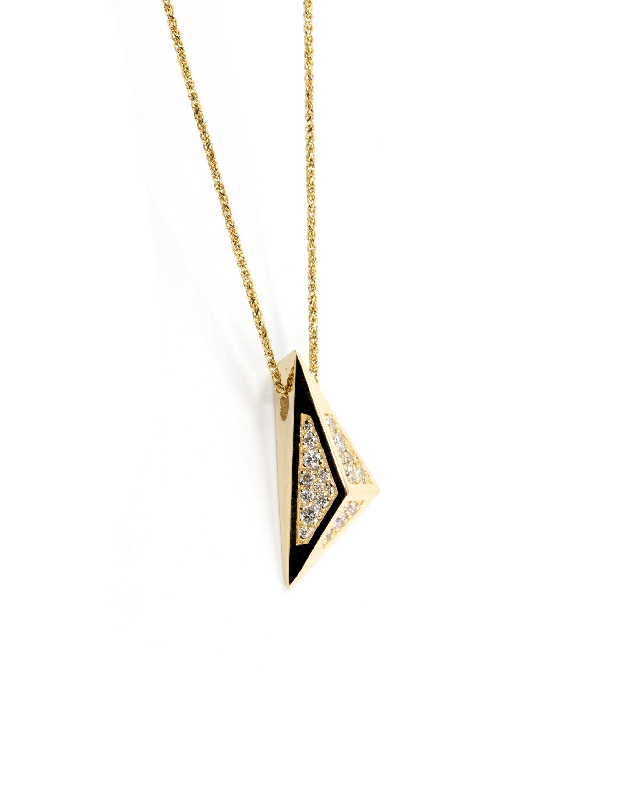 Close-up view of the Edgy Pyramidal Pendant in yellow gold, showcasing the intricate diamond paving and triangular design, set against a pure white backdrop by Bena Jewelry.