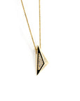 Close-up view of the Edgy Pyramidal Pendant in yellow gold, showcasing the intricate diamond paving and triangular design, set against a pure white backdrop by Bena Jewelry.