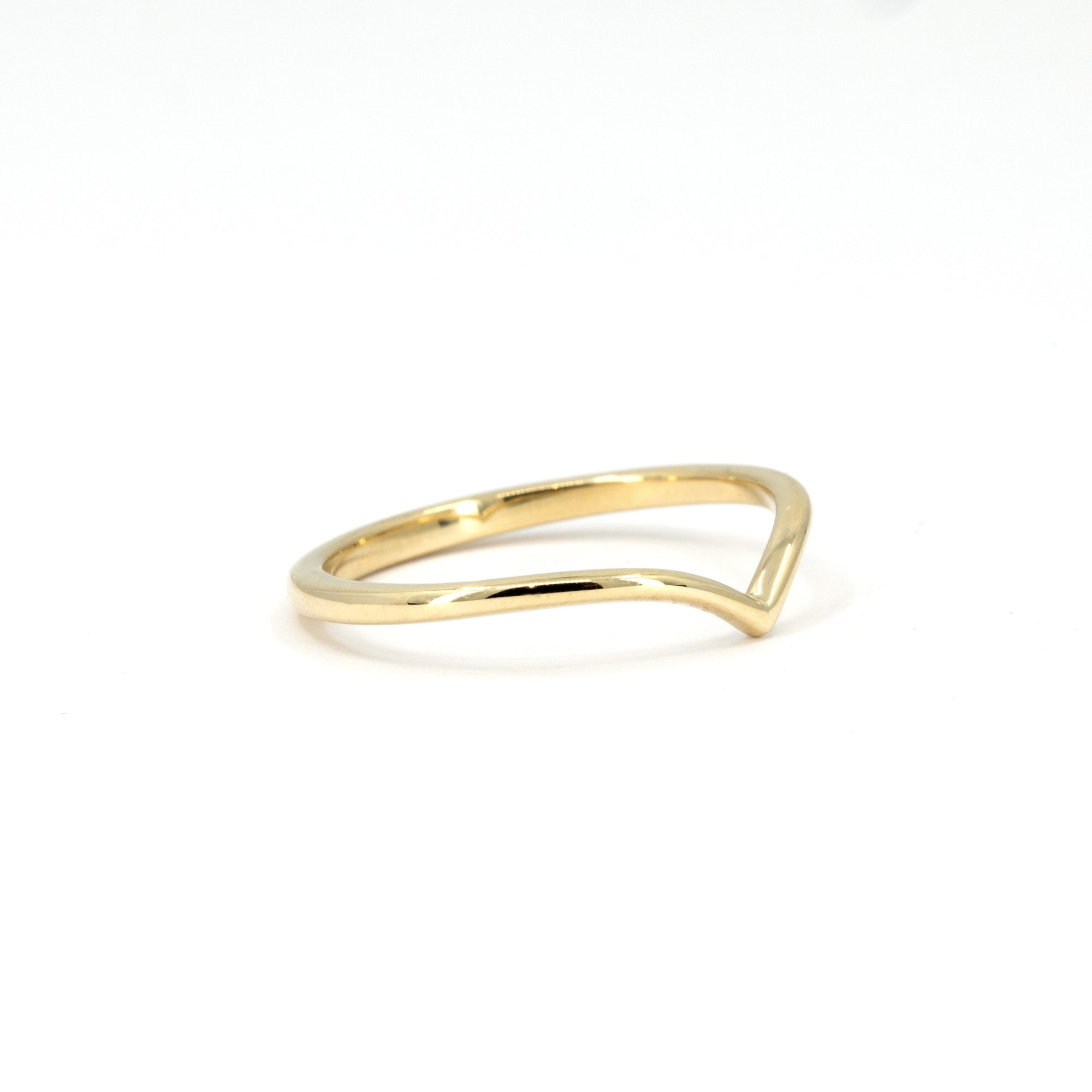 Delicate Vow Band in 14K or 18K yellow gold, handcrafted in Montreal, photographed against a white backdrop.