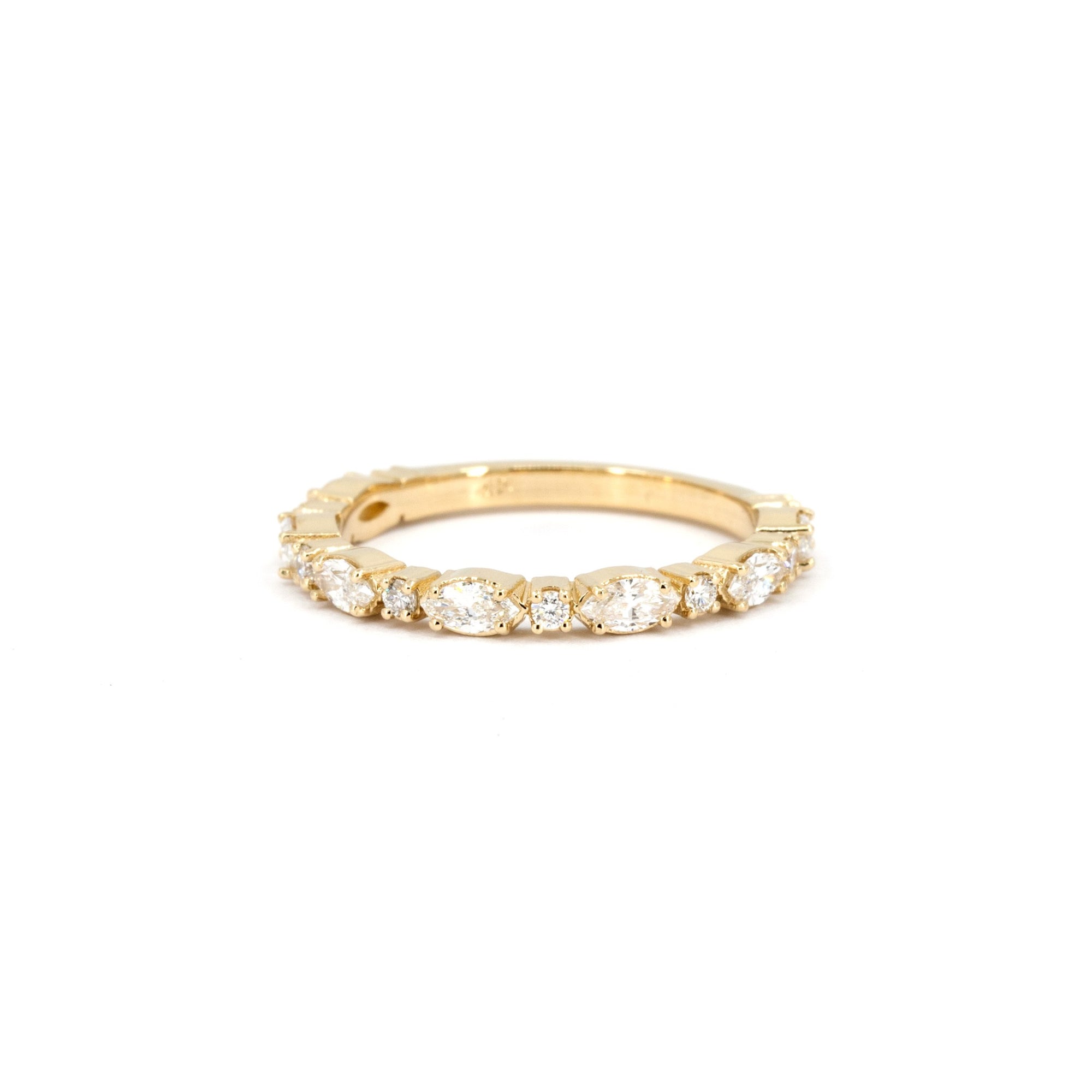 Marquise and round diamond wedding band in yellow gold, handcrafted by Bena Jewelry in Montreal.