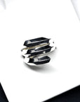Embrace Ring in White Gold on white background – A bold and sculptural unisex ring with an edgy, layered design, handcrafted by Bena Jewelry in Montreal.