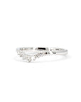Delicate diamond wedding band in white gold, crafted by Canadian designer Bena Jewelry in Montreal, perfect for pairing with engagement rings.