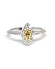 This marquise shape yellow diamond white gold engagement ring is custom made in Montreal, by Bena Jewelry, canadian bridal jeweler.