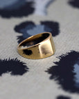 Angled shot of Lump Ring in Yellow Gold – A contemporary statement ring with a minimalist yet bold design.
