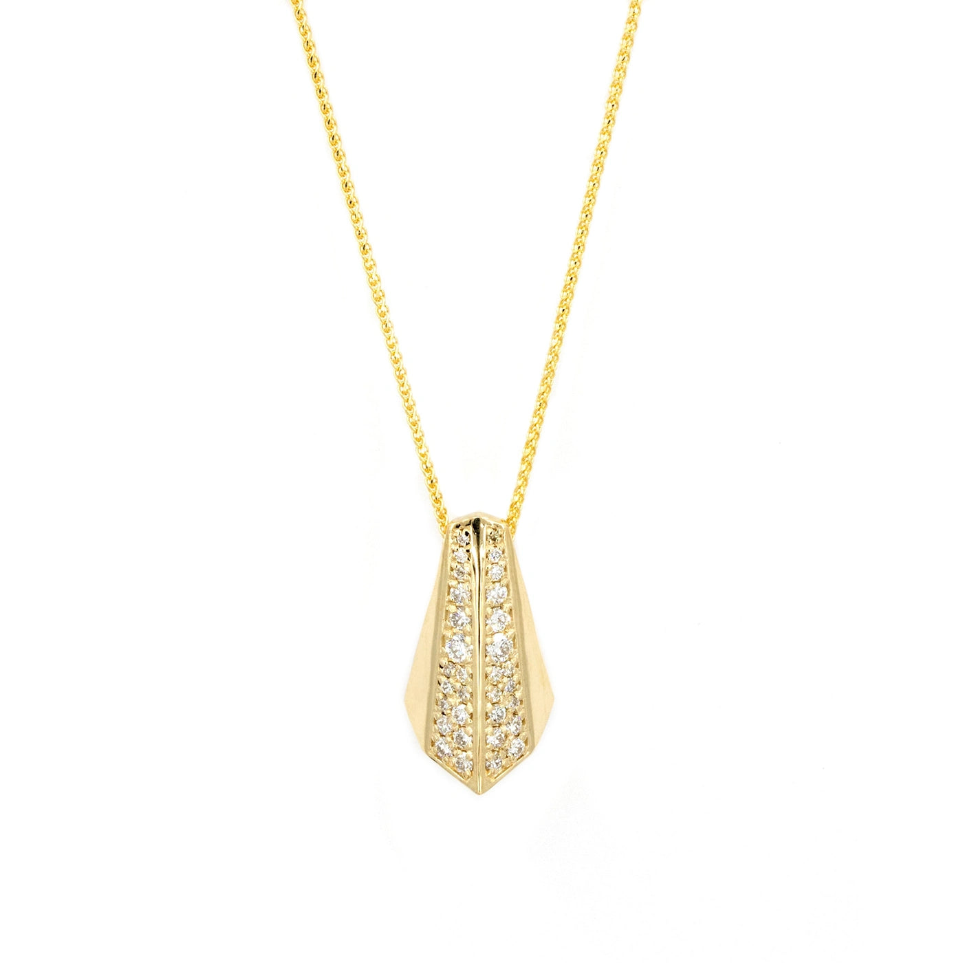 A close-up of the Ballast Pendant by Bena Jewelry, suspended from a delicate yellow gold chain. The pendant has a tapered, geometric shape with sharp, angular edges and a polished gold surface. Two parallel rows of round brilliant-cut diamonds are set in a recessed channel, adding depth and sparkle to the design. The pendant hangs symmetrically, emphasizing its bold, modern aesthetic. Handcrafted in Montreal, this striking statement piece is available at Bena Jewelry.