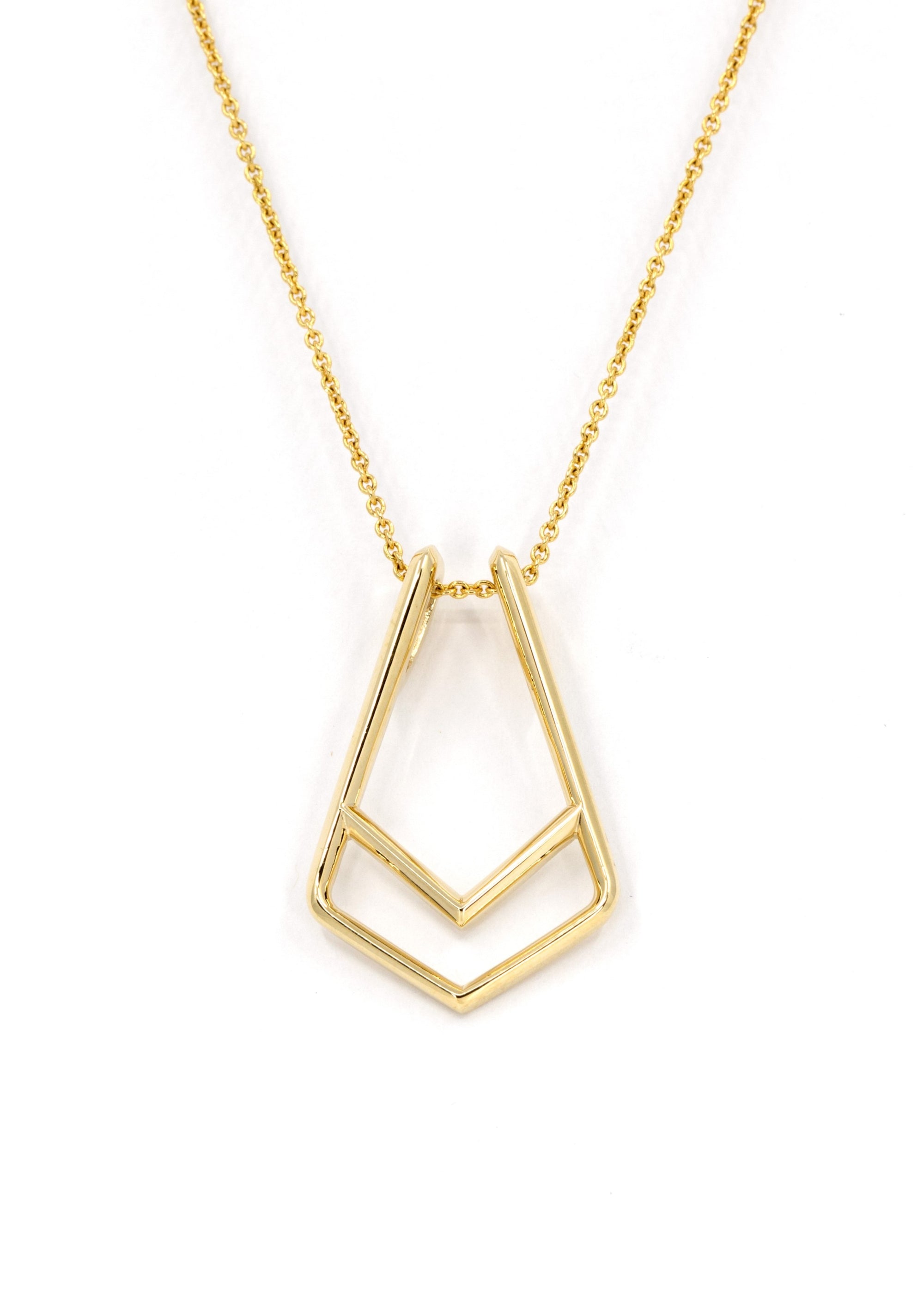 Close-up of the pendant in use, holding a delicate gold ring – Designed to keep your ring safe while elevating your everyday jewelry style.