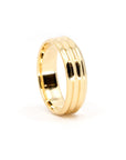 Trois Vagues yellow gold men's wedding band, featuring three sleek central lines, by Bena Jewelry, displayed on a clean white background.