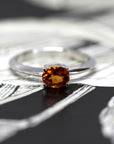 front view of bena jewelry montreal orange gemstone ring custom made color gemstone engagement ring montreal handmade fine jewelry