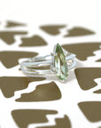 Side view of pear shape diaspore edgy engagement ring handmade in montreal Bena fine jewelry designer color gemstone jewelry custom made in montreal little italy color gemstone specialist