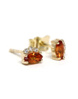 side view of sapphire diamond gold studs earrings bena jewelry designer montreal handmade fine jewelry ruby mardi jewelry gallery canada fine jewelry designer dainty simple gemstone studs earrings montreal