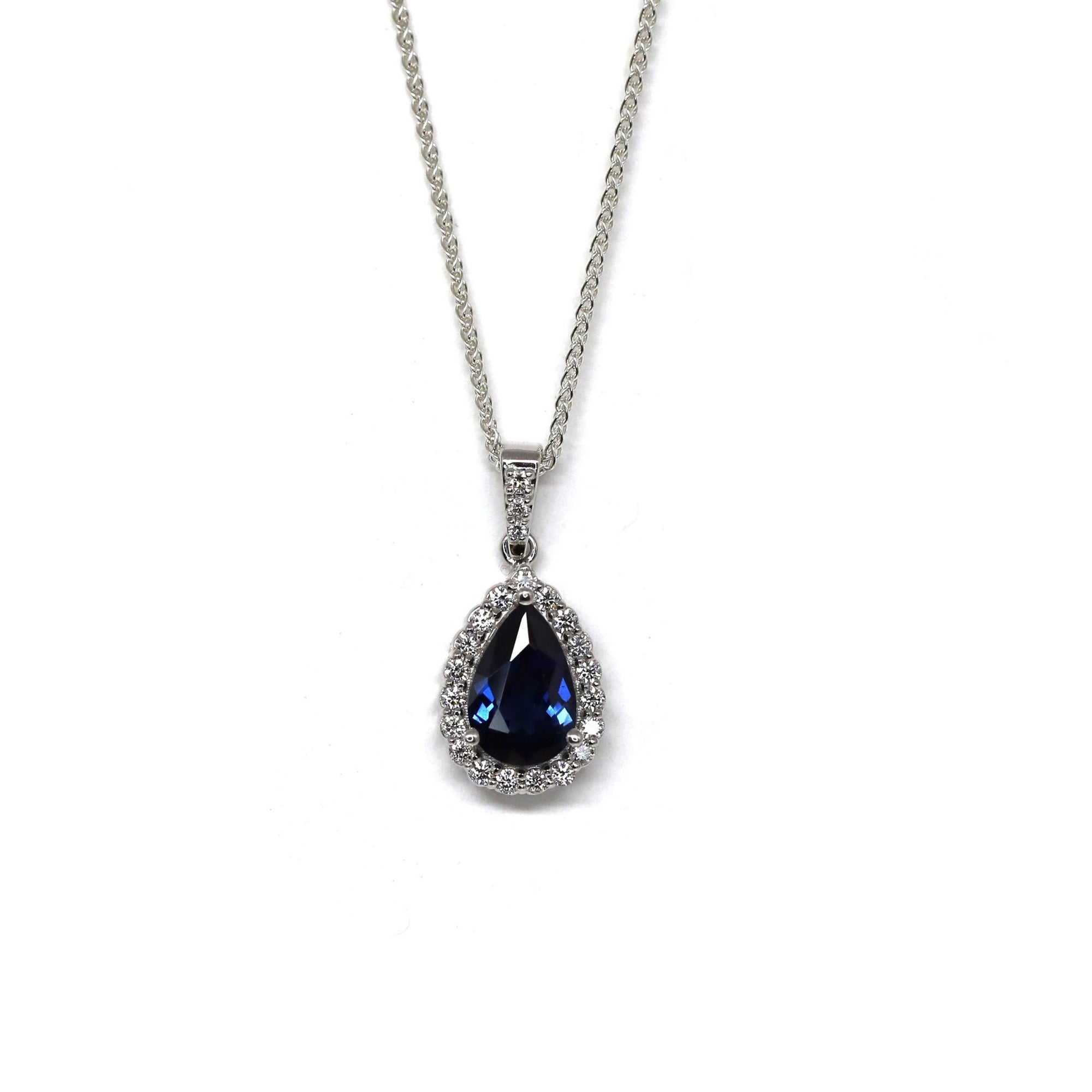 Pear shape sapphire pendant diamond halo bena jewelry designer montreal fine jewelry natural blue gemstone pear shape ethical sapphire jewelry design montreal custom made fine jewelry little italy