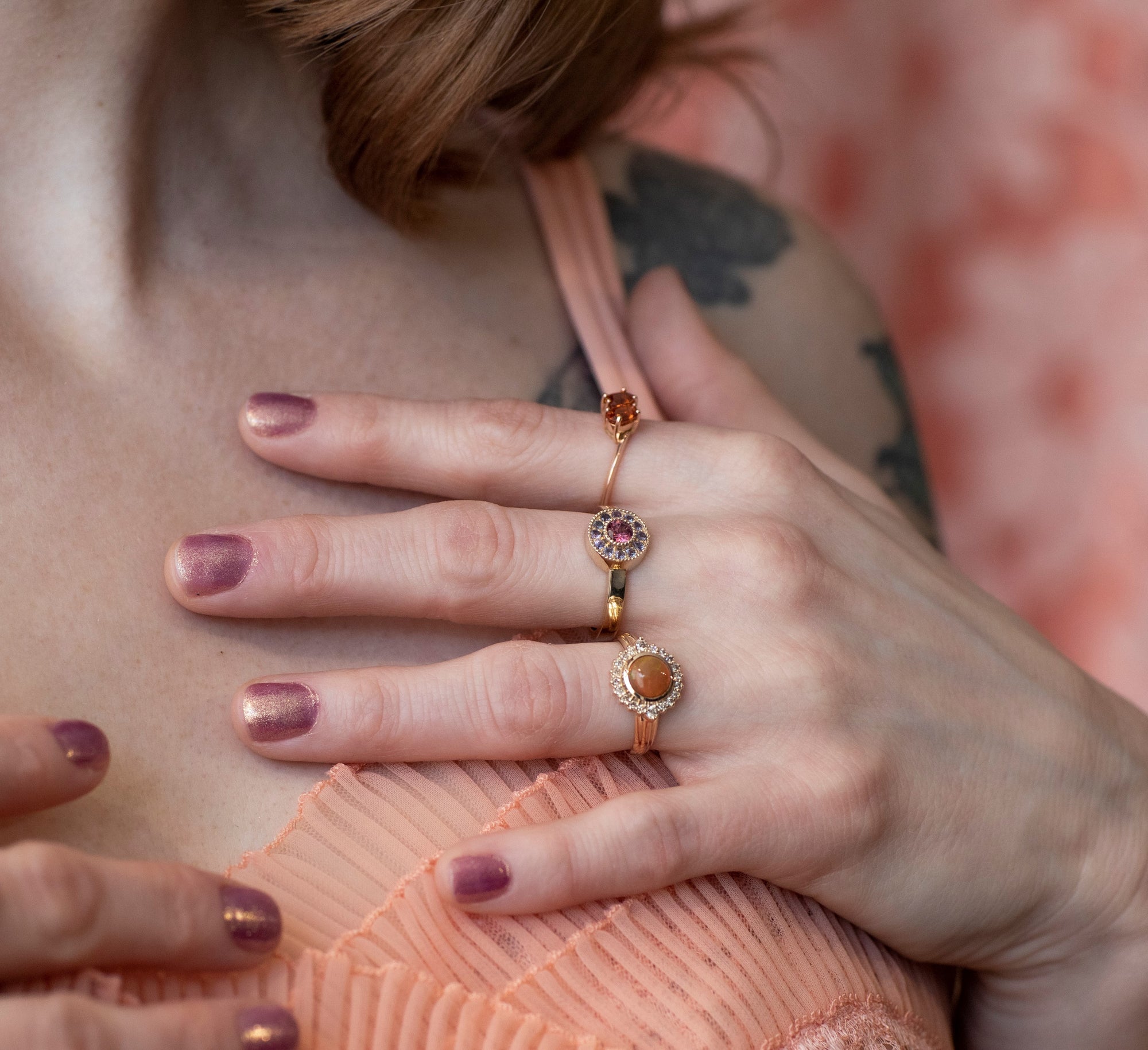 girl wearing bena jewelry opal ring and other engagement ring made in canada