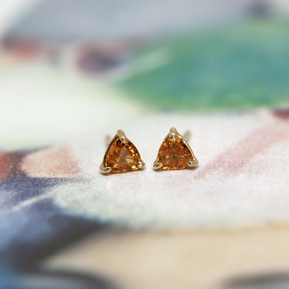 orange trillons sapphire stud earrings bena jewely montreal