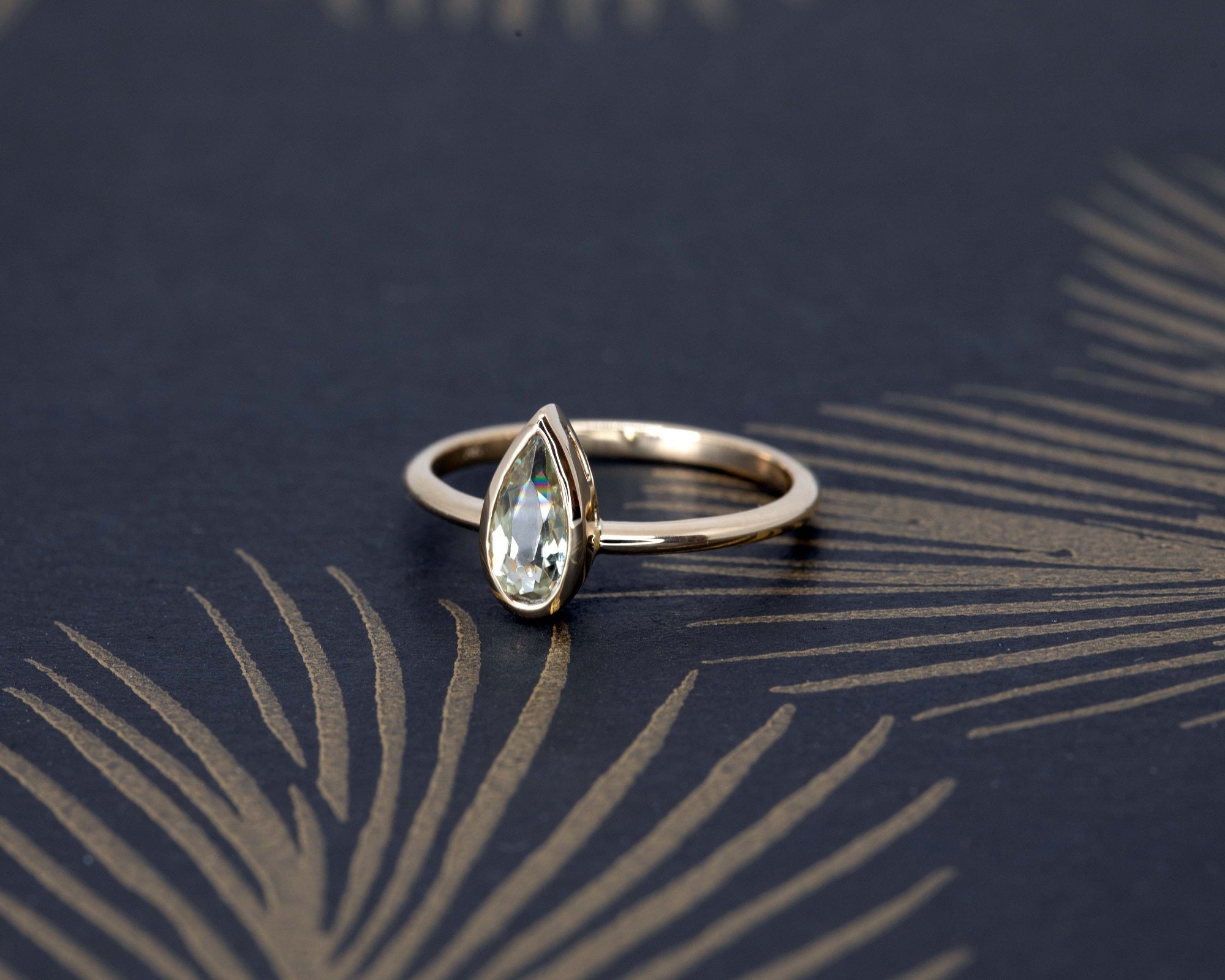 Pear Shape Diaspore Bezel Set Gold Ring