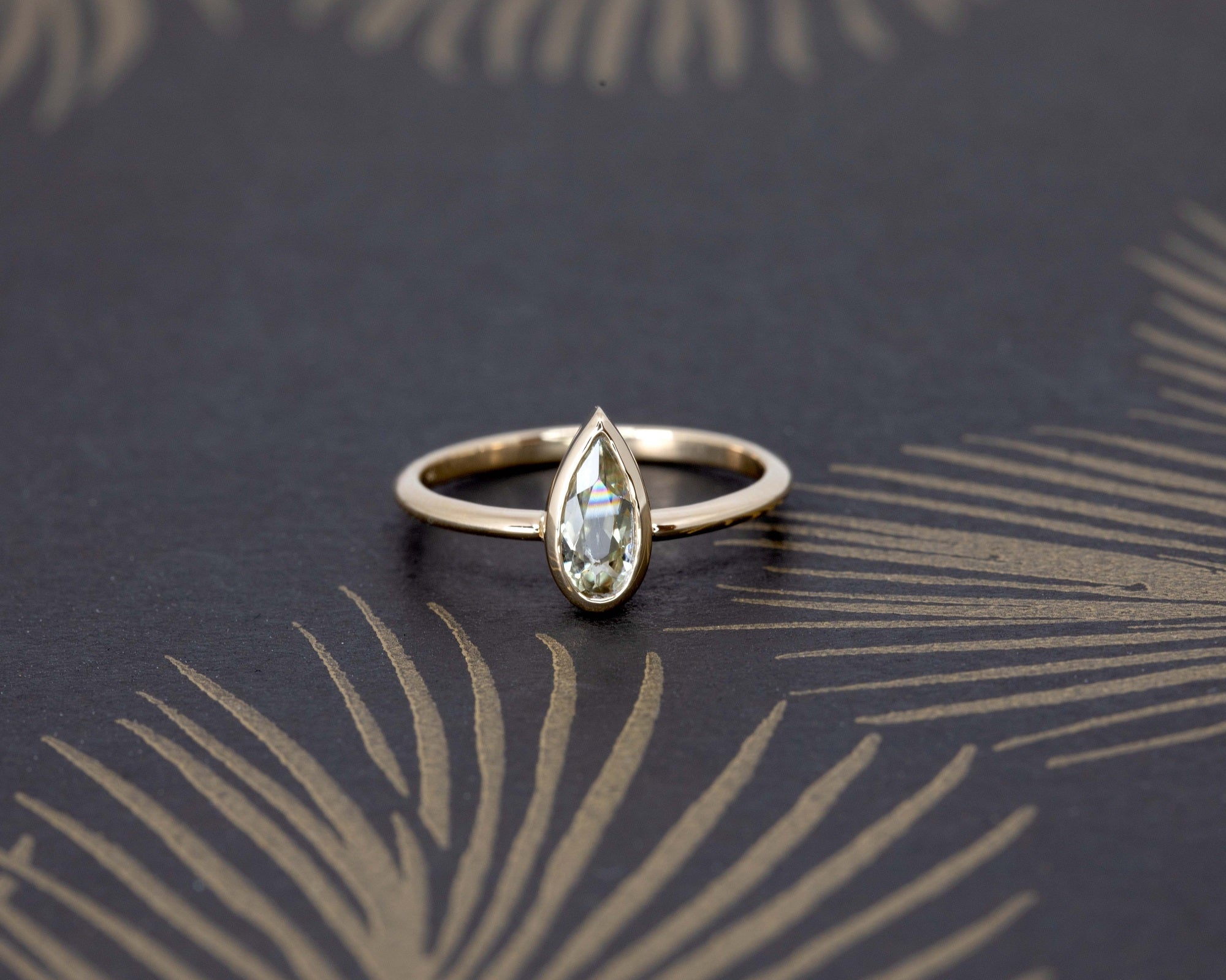 Pear Shape Diaspore Bezel Set Gold Ring