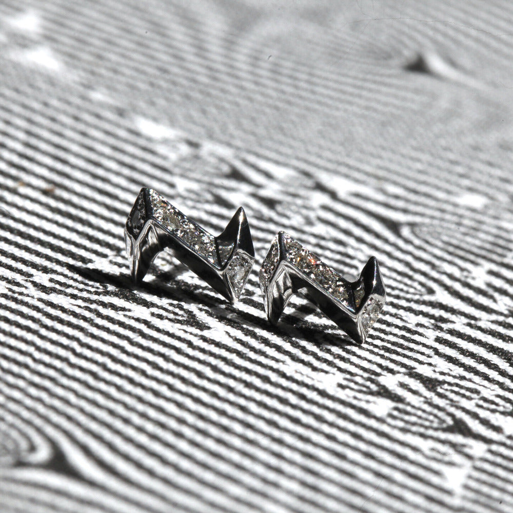 Natural light silver stud earrings thunder shape with round diamond Bena Jewelry Montreal Side View