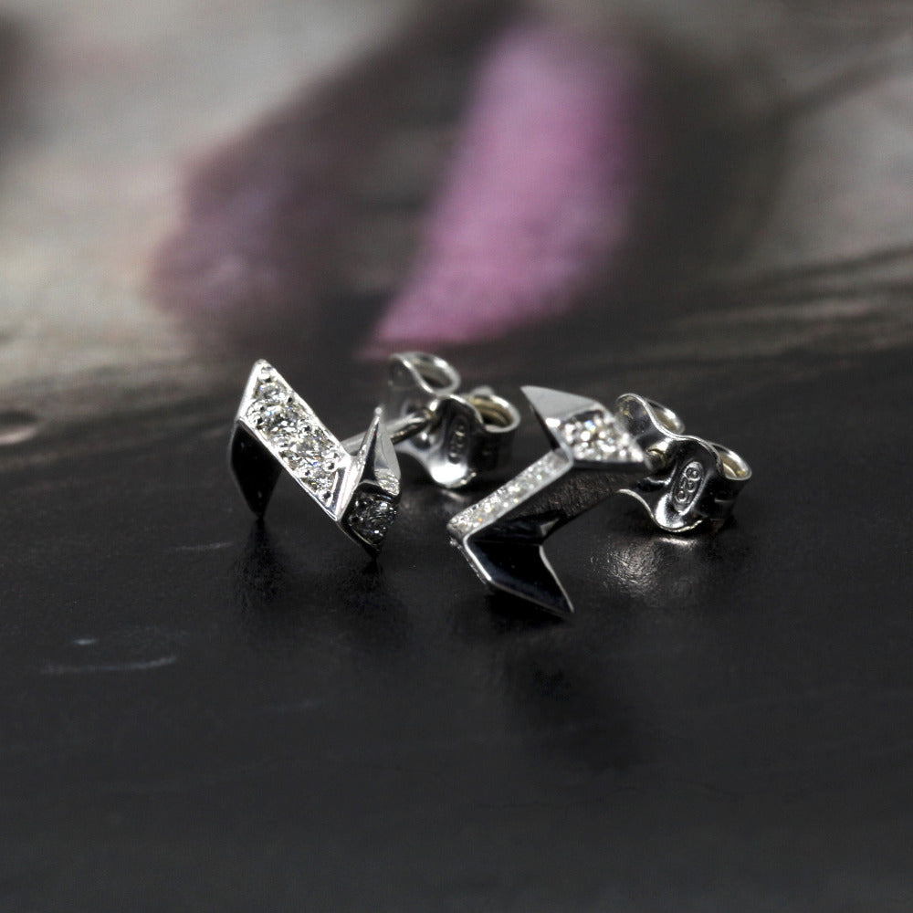 Natural light silver stud earrings thunder shape with round diamond Bena Jewelry Montreal
